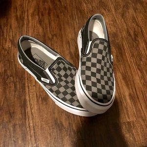 Grey and black checkered slip on vans